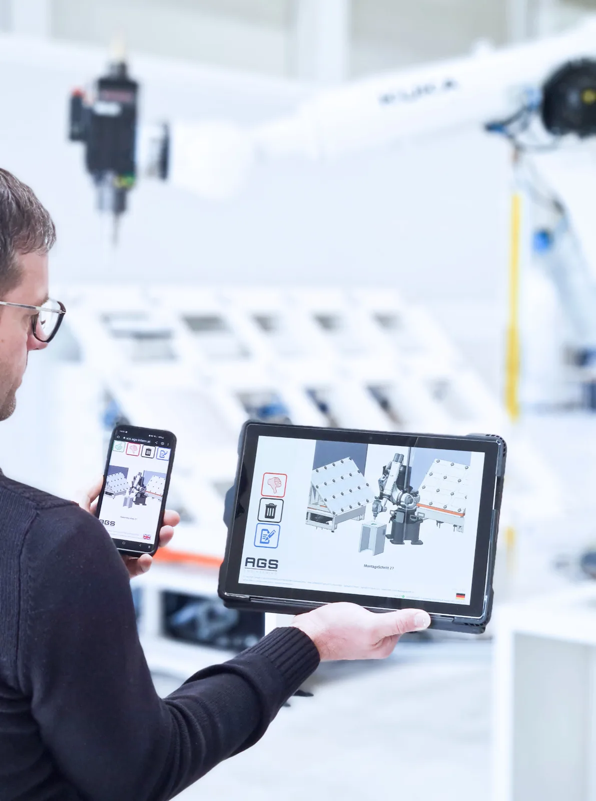 ACS auf Smartphone und Tablet in der Werkshalle