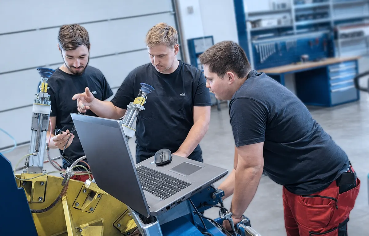 Mechatronics apprentices during the commissioning of a system