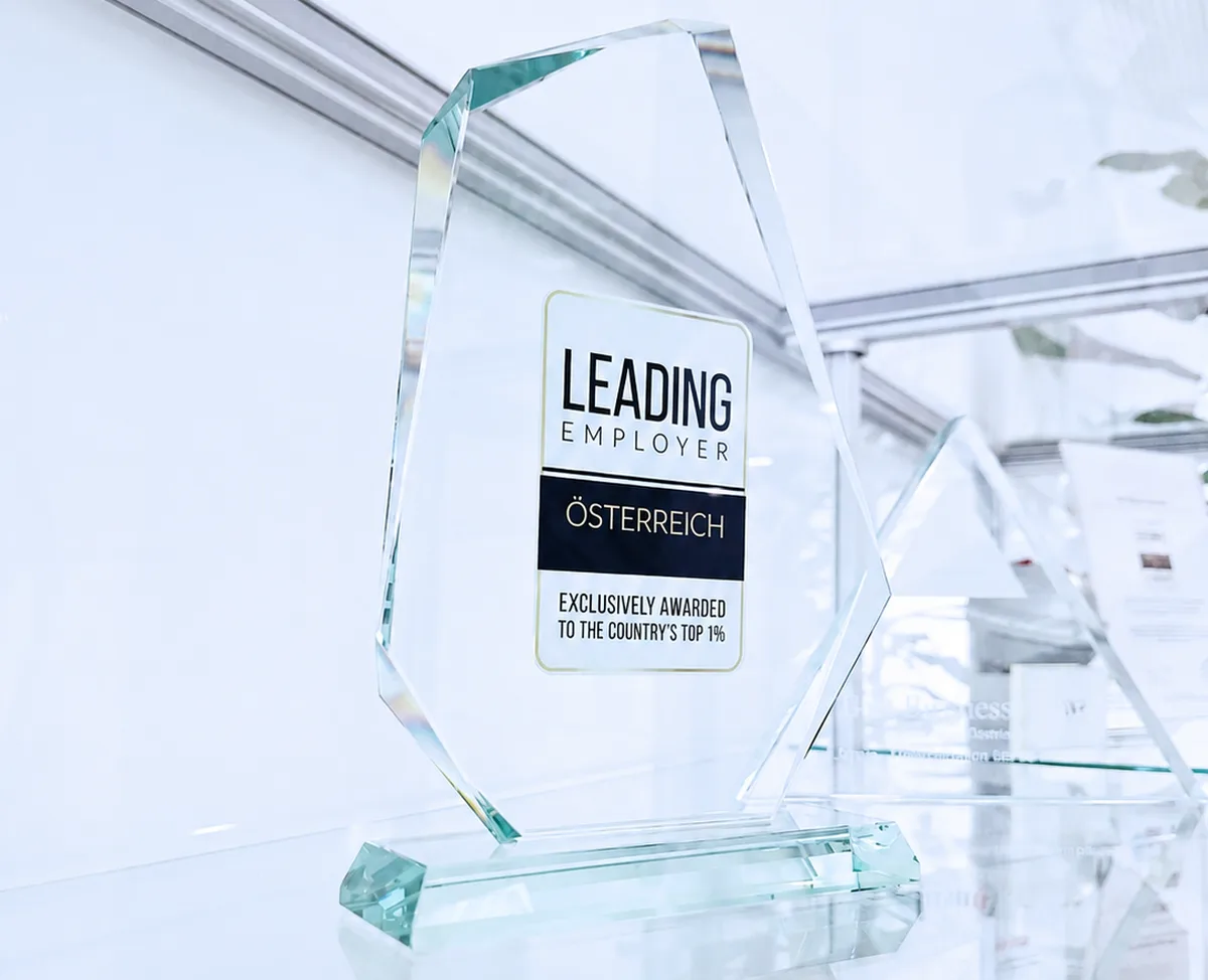Leading Employer Award Austria in the display case at the AGS headquarters